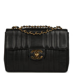 Vintage Jumbo Classic Mademoiselle Vertical Flap Black Caviar Gold Hardware