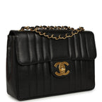 Vintage Jumbo Classic Mademoiselle Vertical Flap Black Caviar Gold Hardware